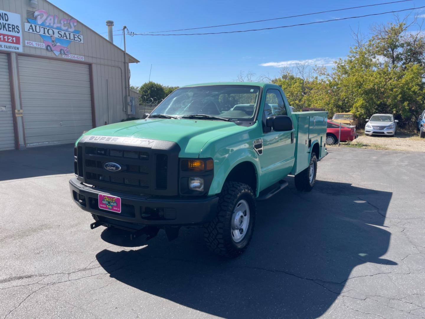 2009 Forest Service Green /Grey Ford F-350 SD XL 4WD (1FTSF31Y09E) with an 6.8L V10 SOHC 30V engine, 6-Speed Manual transmission, located at 813 E Fairview Ave, Meridian , ID, 83642, (208) 336-8230, 43.618851, -116.384010 - Photo#2