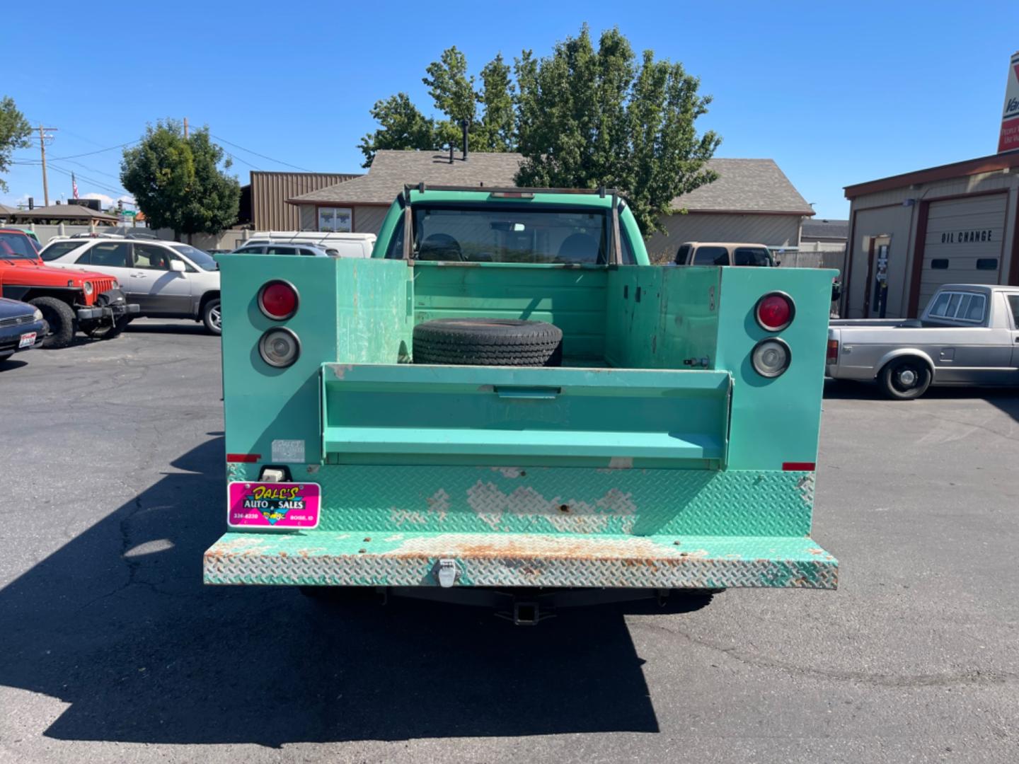 2009 Forest Service Green /Grey Ford F-350 SD XL 4WD (1FTSF31Y09E) with an 6.8L V10 SOHC 30V engine, 6-Speed Manual transmission, located at 813 E Fairview Ave, Meridian , ID, 83642, (208) 336-8230, 43.618851, -116.384010 - Photo#5