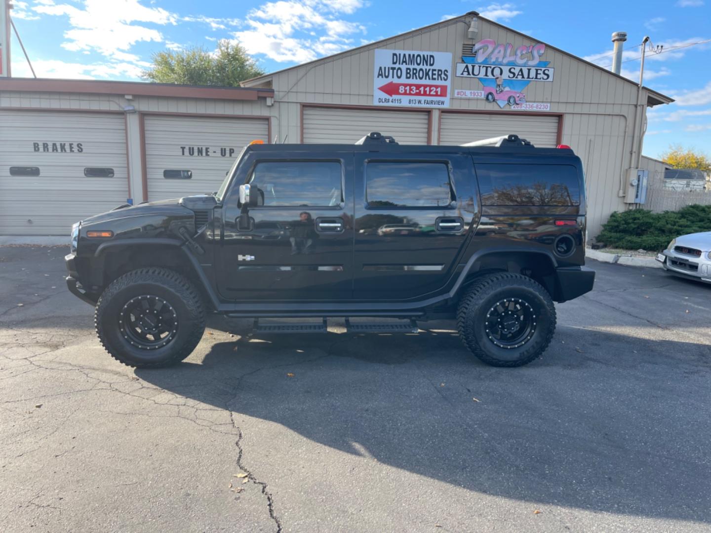 2003 Black /Grey Hummer H2 Adventurer (5GRGN23U43H) with an 6.0L V8 OHV 16V engine, 4-Speed Automatic Overdrive transmission, located at 813 E Fairview Ave, Meridian , ID, 83642, (208) 336-8230, 43.618851, -116.384010 - Photo#0