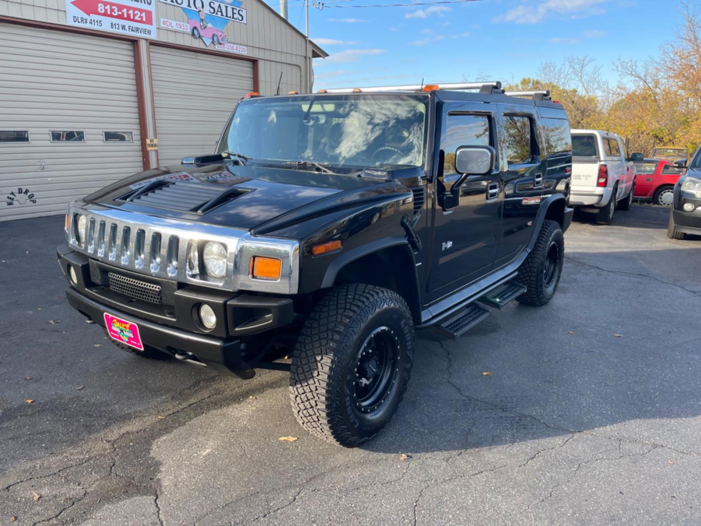 2003 Black /Grey Hummer H2 Adventurer (5GRGN23U43H) with an 6.0L V8 OHV 16V engine, 4-Speed Automatic Overdrive transmission, located at 813 E Fairview Ave, Meridian , ID, 83642, (208) 336-8230, 43.618851, -116.384010 - Photo#2