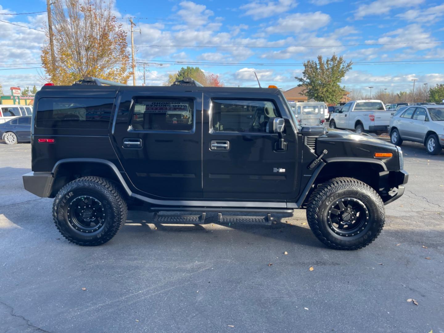 2003 Black /Grey Hummer H2 Adventurer (5GRGN23U43H) with an 6.0L V8 OHV 16V engine, 4-Speed Automatic Overdrive transmission, located at 813 E Fairview Ave, Meridian , ID, 83642, (208) 336-8230, 43.618851, -116.384010 - Photo#4