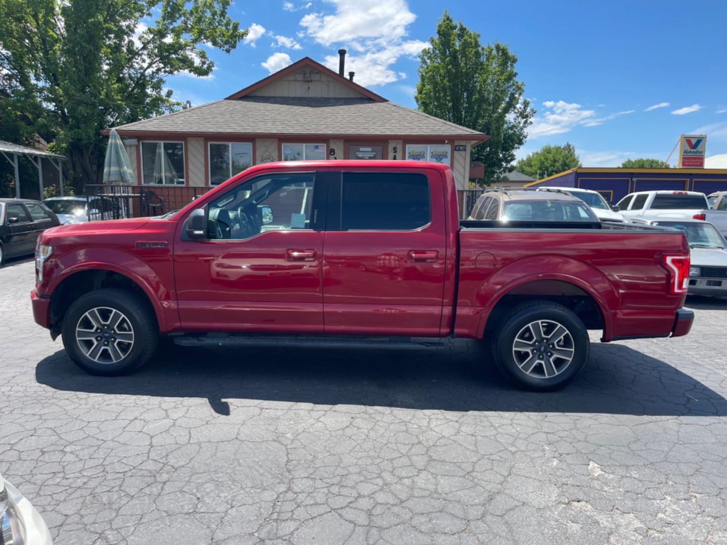 2015 Maroon /Black Ford F-150 XLT (1FTEW1CP2FK) with an 2.7 Ecoboost engine, AT transmission, located at 813 E Fairview Ave, Meridian , ID, 83642, (208) 336-8230, 43.618851, -116.384010 - Photo#0