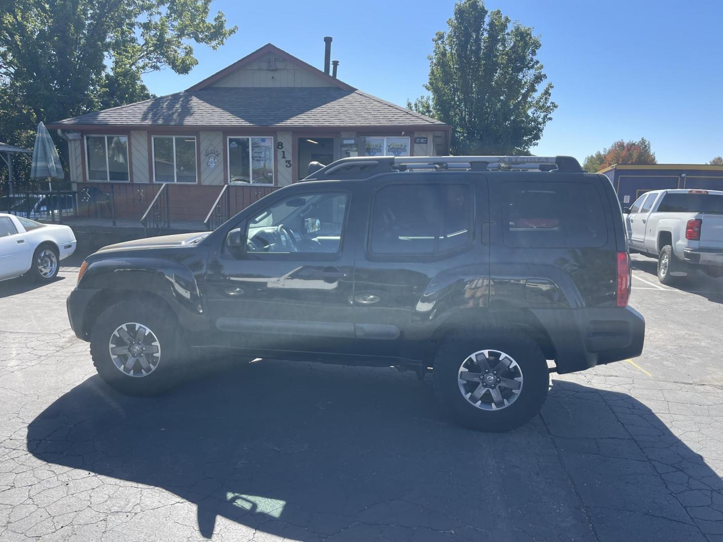 2015 Black /Grey Nissan Xterra PRO-4X (5N1AN0NW9FN) with an 4.0L V6 DOHC 24V engine, 5-Speed Automatic transmission, located at 813 E Fairview Ave, Meridian , ID, 83642, (208) 336-8230, 43.618851, -116.384010 - Photo#0