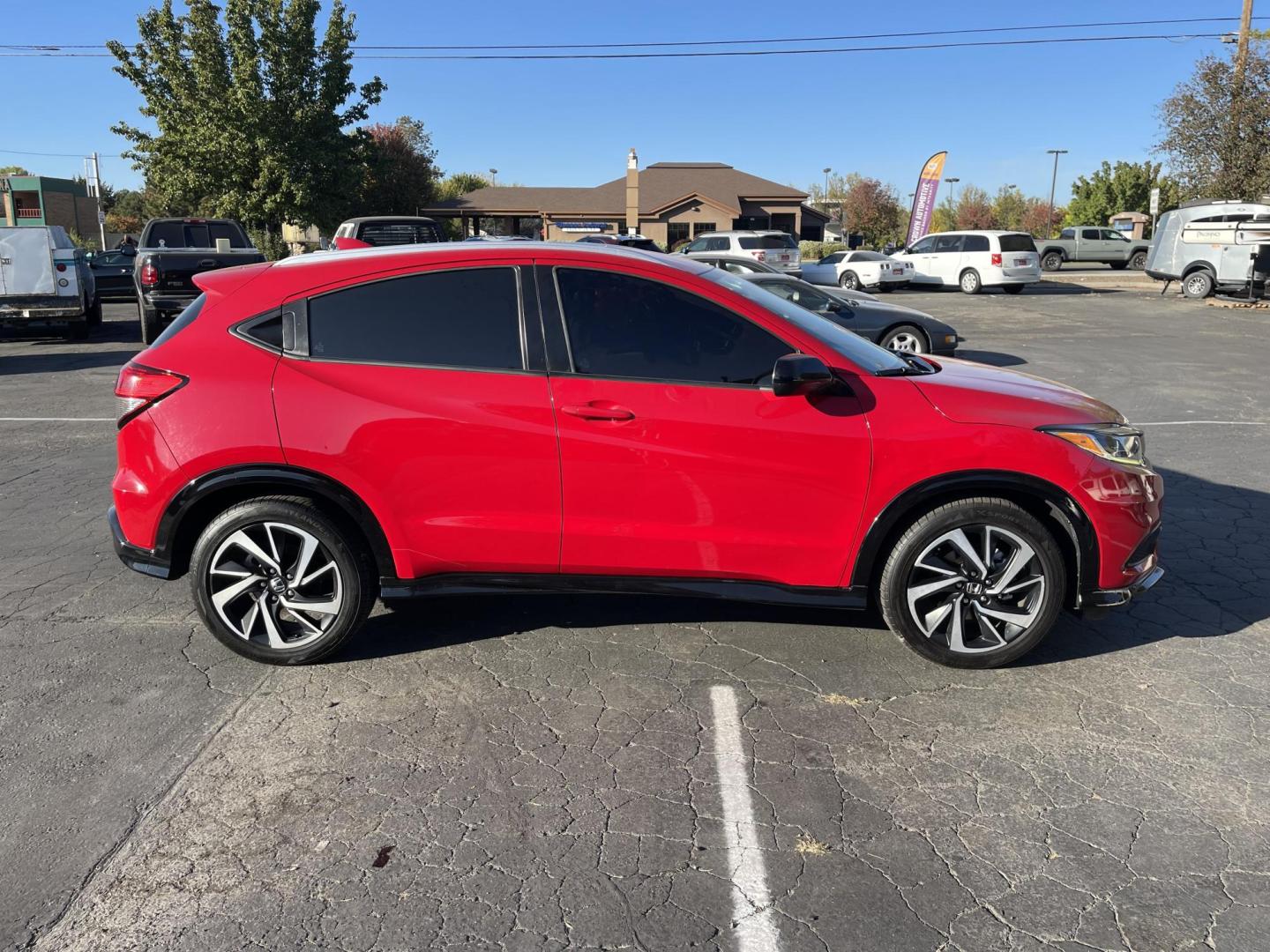 2019 RED /Black Honda HR-V Sport (3CZRU5H1XKG) with an 1.8L L4 DOHC 16V engine, CVT transmission, located at 813 E Fairview Ave, Meridian , ID, 83642, (208) 336-8230, 43.618851, -116.384010 - Photo#1