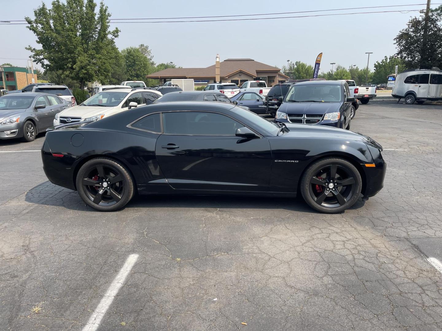 2012 Black /Black Chevrolet Camaro Coupe 1LT (2G1FB1E35C9) with an 3.6L V6 DOHC 24V FFV engine, 6-Speed Automatic transmission, located at 813 E Fairview Ave, Meridian , ID, 83642, (208) 336-8230, 43.618851, -116.384010 - Photo#4