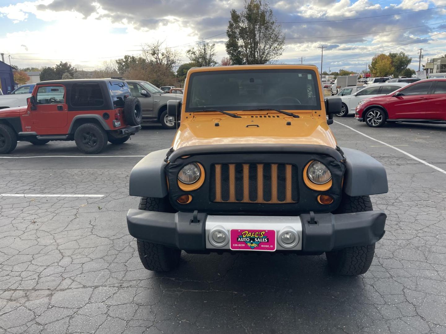 2012 Orange /Black Jeep Wrangler Sport 4WD (1C4AJWAG0CL) with an 3.6L V6 DOHC 24V FFV engine, 6-Speed Manual transmission, located at 813 E Fairview Ave, Meridian , ID, 83642, (208) 336-8230, 43.618851, -116.384010 - Photo#1