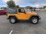 2012 Orange /Black Jeep Wrangler Sport 4WD (1C4AJWAG0CL) with an 3.6L V6 DOHC 24V FFV engine, 6-Speed Manual transmission, located at 813 E Fairview Ave, Meridian , ID, 83642, (208) 336-8230, 43.618851, -116.384010 - Photo#3