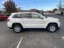 2014 White /Tan Jeep Grand Cherokee Laredo 4WD (1C4RJFAG5EC) with an 3.6L V6 DOHC 24V engine, 5-Speed Automatic transmission, located at 813 E Fairview Ave, Meridian , ID, 83642, (208) 336-8230, 43.618851, -116.384010 - Photo#4