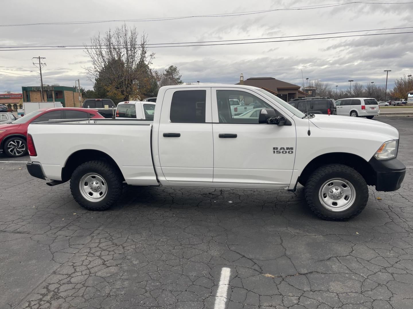 2017 White /Grey RAM 1500 Tradesman Quad Cab 4WD (1C6RR7FG8HS) with an 3.6L V6 DOHC 24V FFV engine, 8A transmission, located at 813 E Fairview Ave, Meridian , ID, 83642, (208) 336-8230, 43.618851, -116.384010 - Photo#3