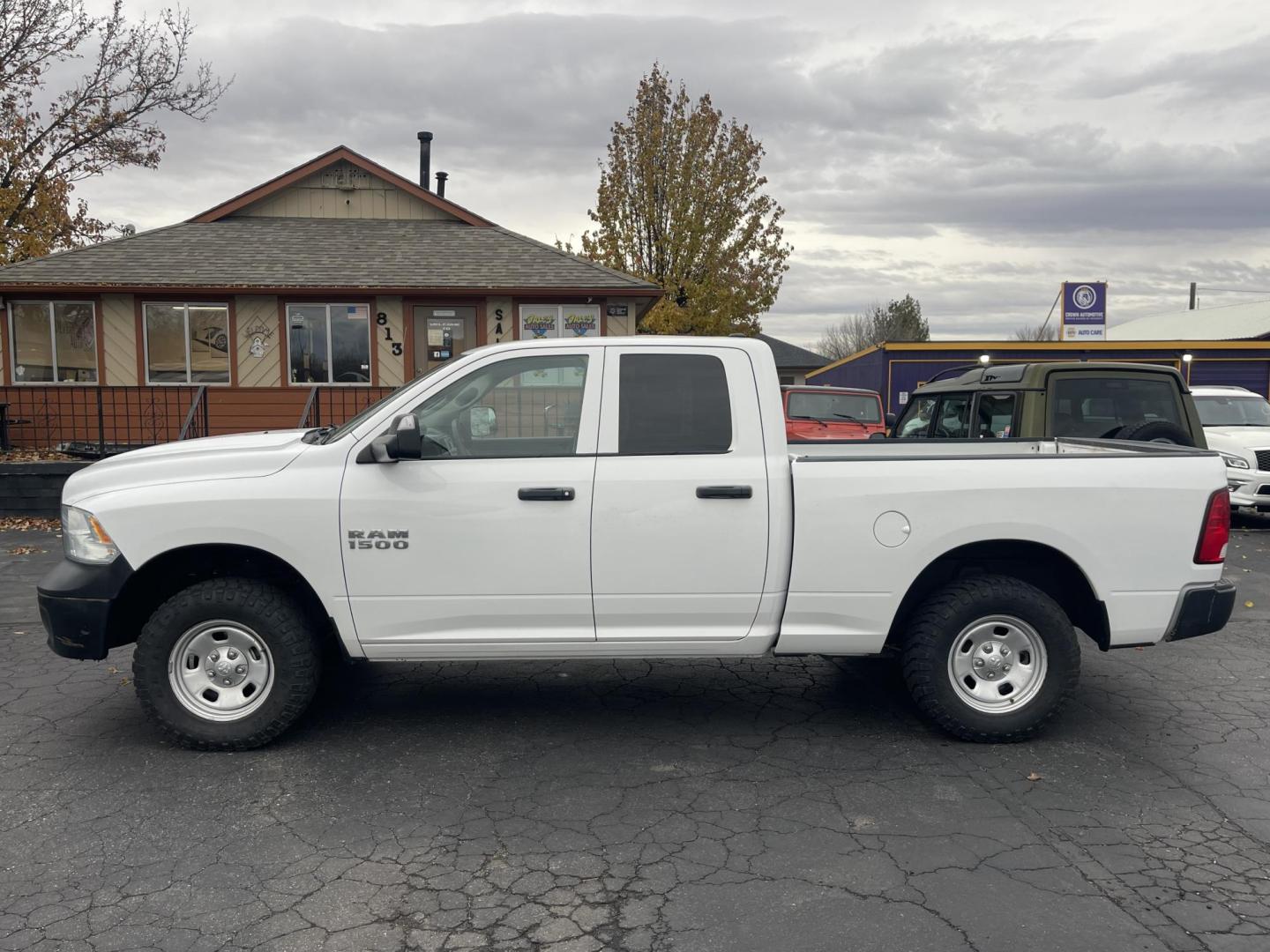 2017 White /Grey RAM 1500 Tradesman Quad Cab 4WD (1C6RR7FG8HS) with an 3.6L V6 DOHC 24V FFV engine, 8A transmission, located at 813 E Fairview Ave, Meridian , ID, 83642, (208) 336-8230, 43.618851, -116.384010 - Photo#0