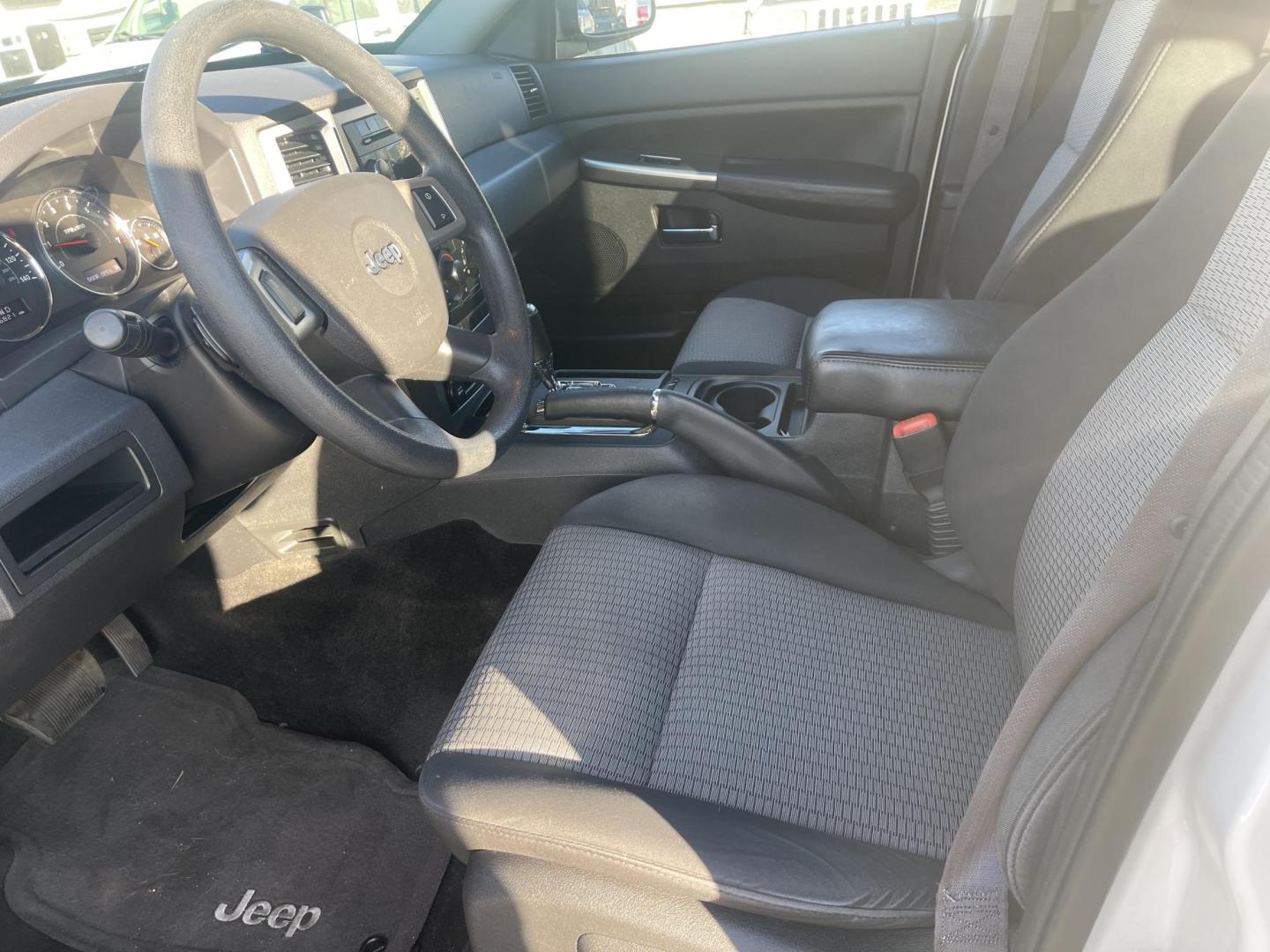 2010 White /Grey Jeep Grand Cherokee Laredo 4WD (1J4PR4GK5AC) with an 3.7L V6 SOHC 12V engine, 5-Speed Automatic transmission, located at 813 E Fairview Ave, Meridian , ID, 83642, (208) 336-8230, 43.618851, -116.384010 - Photo#12