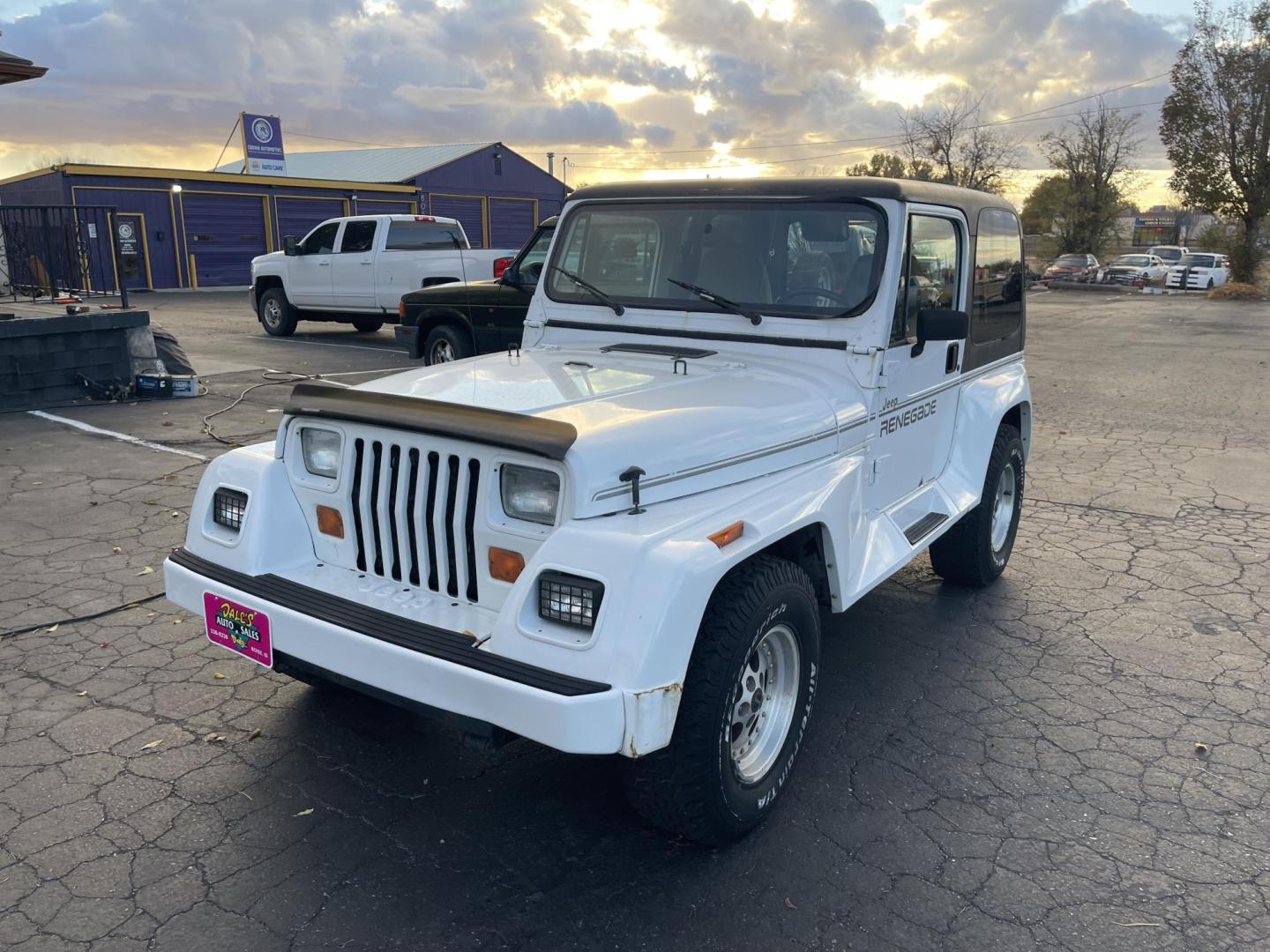 1993 White /Grey Jeep Wrangler Renegade (1J4FY69SXPP) with an 4.0L L6 OHV 12V engine, 5spd Manual transmission, located at 813 E Fairview Ave, Meridian , ID, 83642, (208) 336-8230, 43.618851, -116.384010 - Photo#2