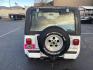 1993 White /Grey Jeep Wrangler Renegade (1J4FY69SXPP) with an 4.0L L6 OHV 12V engine, 5spd Manual transmission, located at 813 E Fairview Ave, Meridian , ID, 83642, (208) 336-8230, 43.618851, -116.384010 - Photo#3